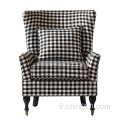 Chaise à bras plaid noir et blanc à roulettes